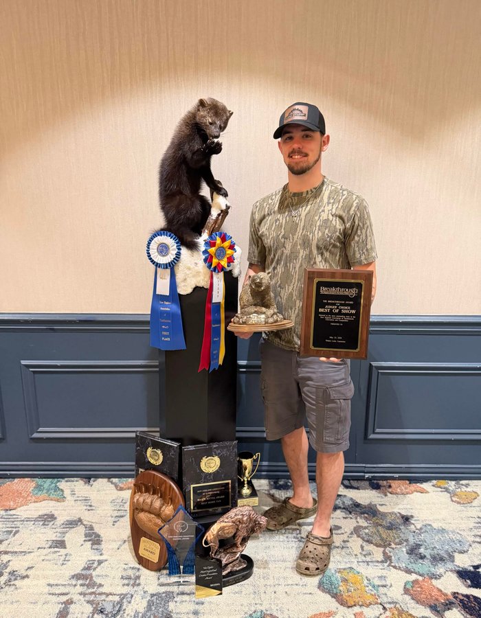 Cole Young with his recent Breakthrough Award